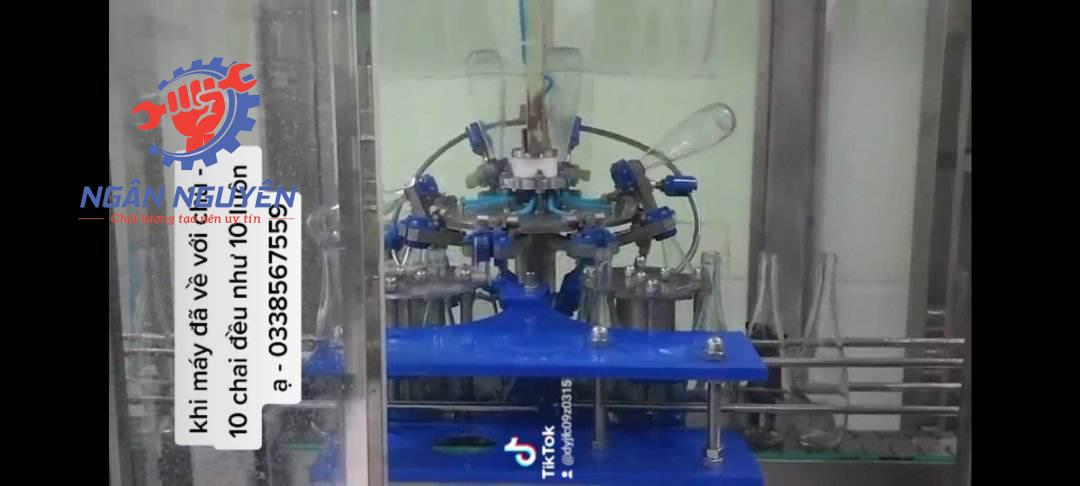 Máy rửa chai mâm quay tự động Máy rửa chai mâm quay tự động